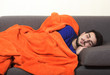 © rodjulian - Man sleeping on the couch