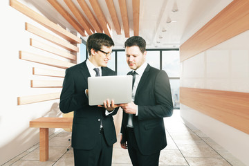 Sticker - Business partners with laptop in wood style office