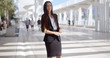 © Dash - Happy Beautiful Business Woman Standing Outdoor