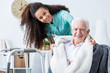 © Photographee.eu - Smiling doctor caring about patient