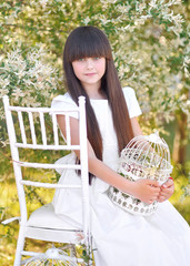 Canvas Print - portrait of little girl outdoors in summer