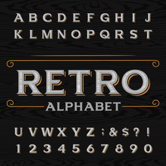 Poster - distressed retro vector typeface. letters, numbers and symbols on the dark wood textured background.