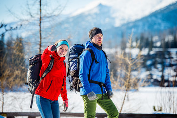 Wall Mural - Young couple on a hike