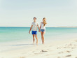 © Sergey Nivens - Romantic young couple on the beach
