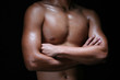 © 1911 - A hunky young asian male folding his hands with muscular chest