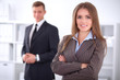 © rogerphoto - Face of beautiful business woman on the background of business people
