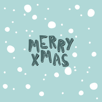 Card with an inscription. Marry Xmas on a light blue background with snowflakes
