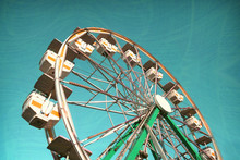 Aged And Worn Vintage Photo Of Ferris Wheel