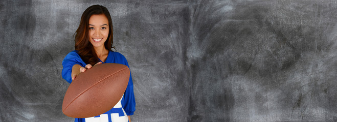 Woman Holding A Football