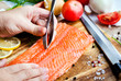 Process of cutting raw salmon