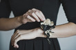 The corsage on the girls hand 4469.