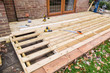 Wooden decking, deck, patio construction.