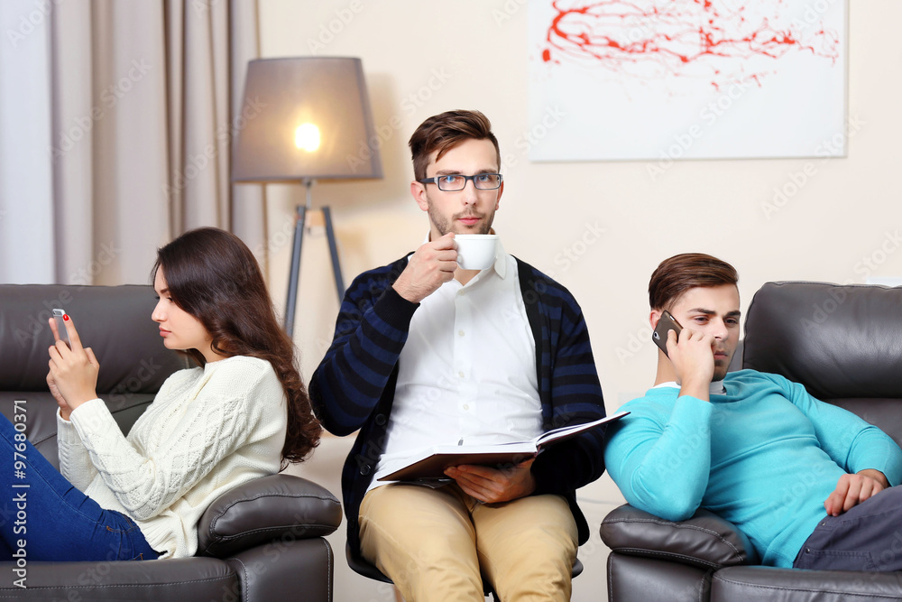 Young couple with problem on reception for family psychologist