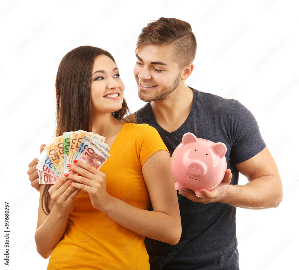 Couple pig money box and banknotes isolated on white