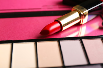 Cosmetics on pink background, closeup