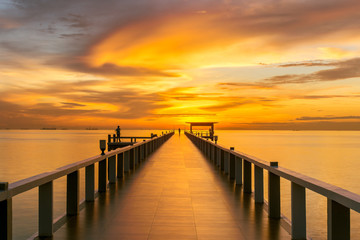 Wooden pier between sunset in Phuket, Thailand