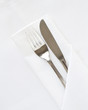 Knife and Fork with white linen
