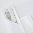Table setting with white linen
