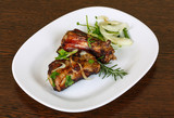 Fototapeta Sypialnia - Grilled pork ribs
