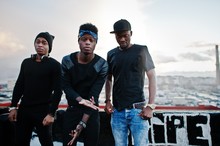 Three Rap Singers Band On The Roof