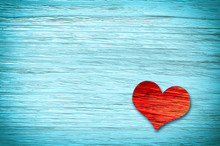 Wooden Heart On Blue Background. Valentines Day.
