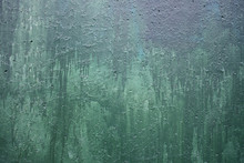 Wall With A Faded Green Paint Color
