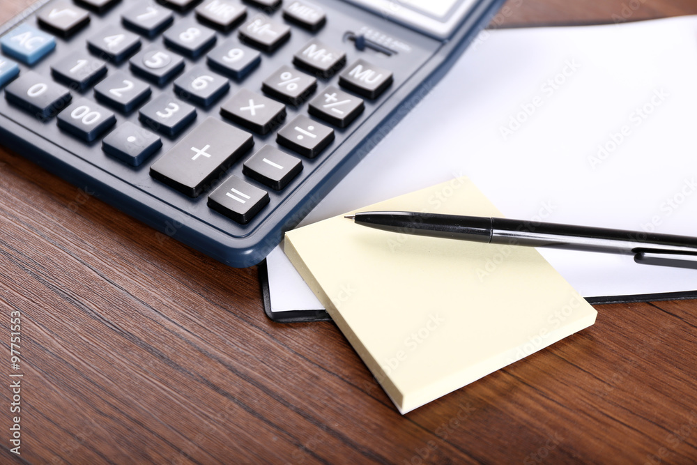 Office supply on wooden background
