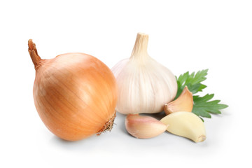Wall Mural - Garlic and onion with parsley leaves isolated on white