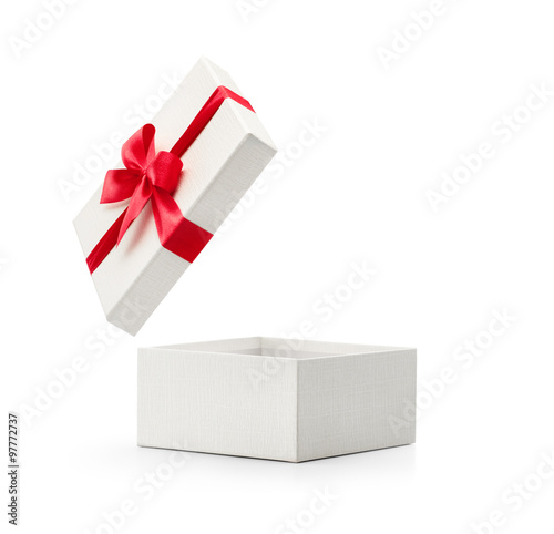 Fotografía White gift box with red bow isolated on white background - Clipping path include