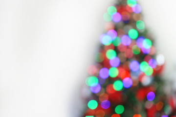 Wall Mural - Christmas lights on Christmas tree of abstract background