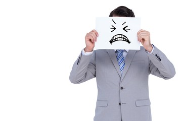 Poster - Composite image of businessman holding blank sign