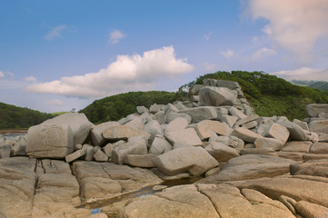 Wall Mural - Ruined Cape - The storm-blasted Cape on the wild coast of sea of Japan. Primorski Krai, Far East, Russia.