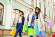 © Sergey Novikov - Friends with shopping bags during travel in Europe
