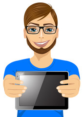 Wall Mural - young hipster man displaying tablet