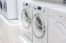 Laudry Dryers And Washing Mashines In Appliance Store