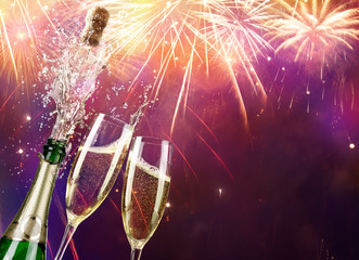 champagne and bottle with fireworks