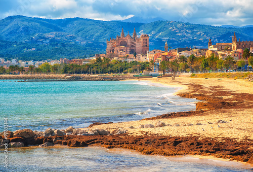 Fotografie, Obraz Sand beach in Palma de Mallorca, gothic cathedral in background, Spain