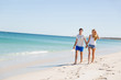 © Sergey Nivens - Romantic young couple on the beach
