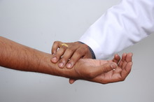 Doctor Hand Holding Patent Hand