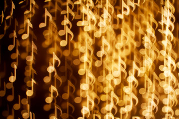 Wall Mural - Blurring lights bokeh background of music notes