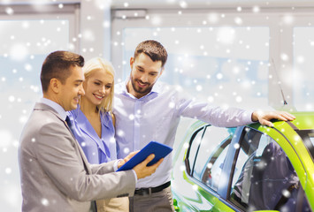 Poster - happy couple with car dealer in auto show or salon