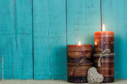 Fotografie, Obraz Candles by rope heart and rustic wood background