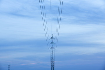 High voltage post at sunset