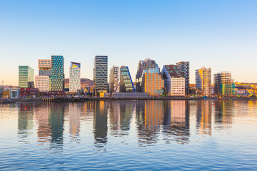 Wall Mural - Modern buildings in Oslo with their reflection into the water