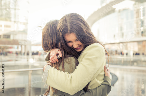 Fotografie, Obraz Two girls hugging each others after long time they have been dis