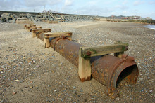 Sewer Pipe On Beach