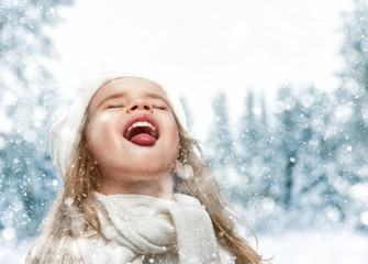 Wall Mural - child girl on a winter walk