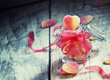 Fruit Jelly Pink And Yellow Candy Hearts In A Glass Jar With A P