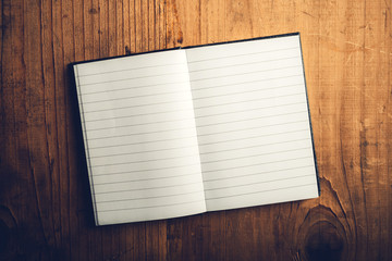 Open notebook with blank pages