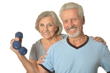 Canvas Print - Senior Couple Standing With Dumbbells